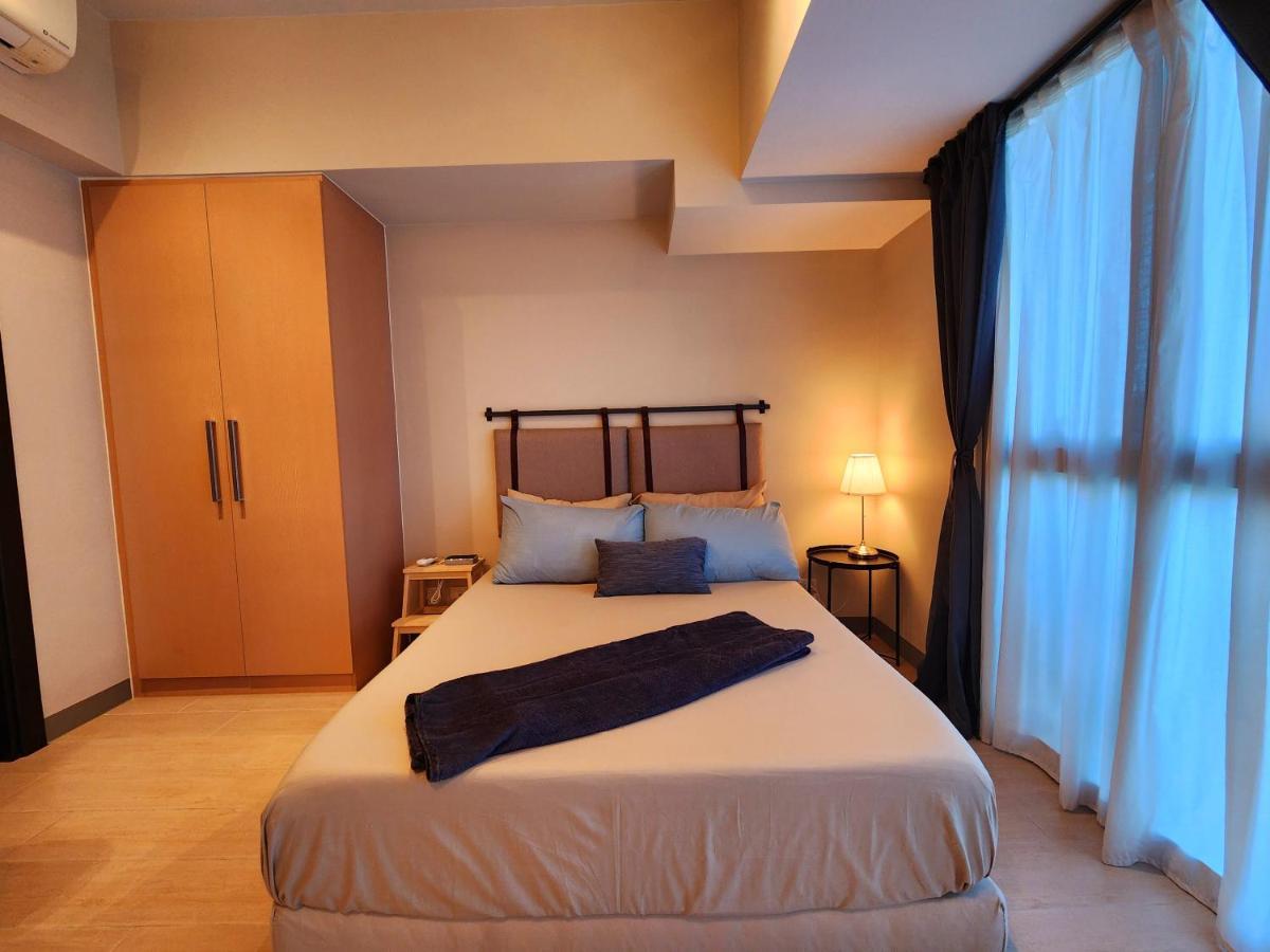Spacious 7U Homey Unit Steps Away From Uptown Mall And Mitsukoshi Mall Free Parking With Washer مانيلا المظهر الخارجي الصورة